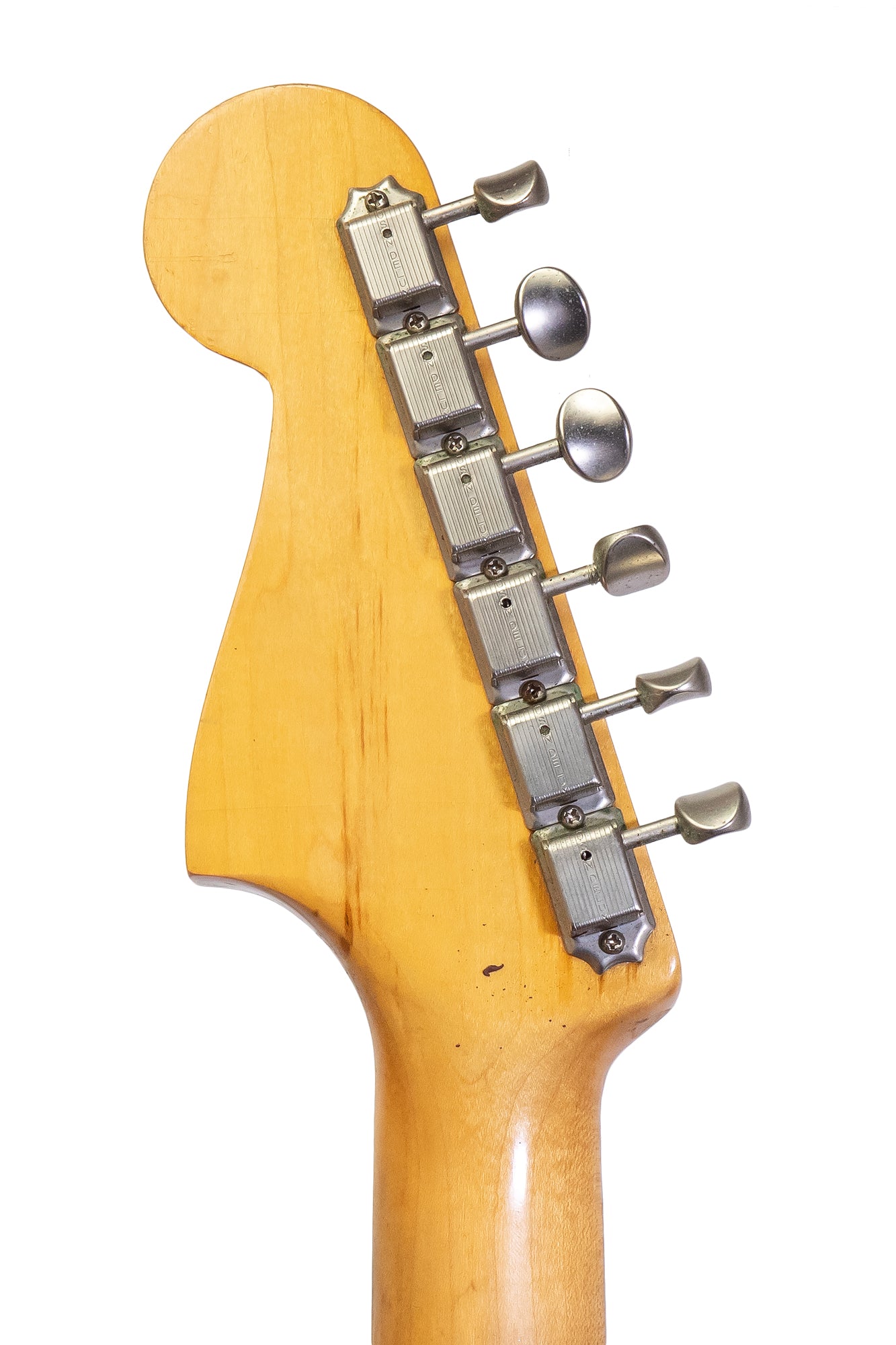 headstock and tuners from a vintage 1960 Fender Jazzmaster electric guitar