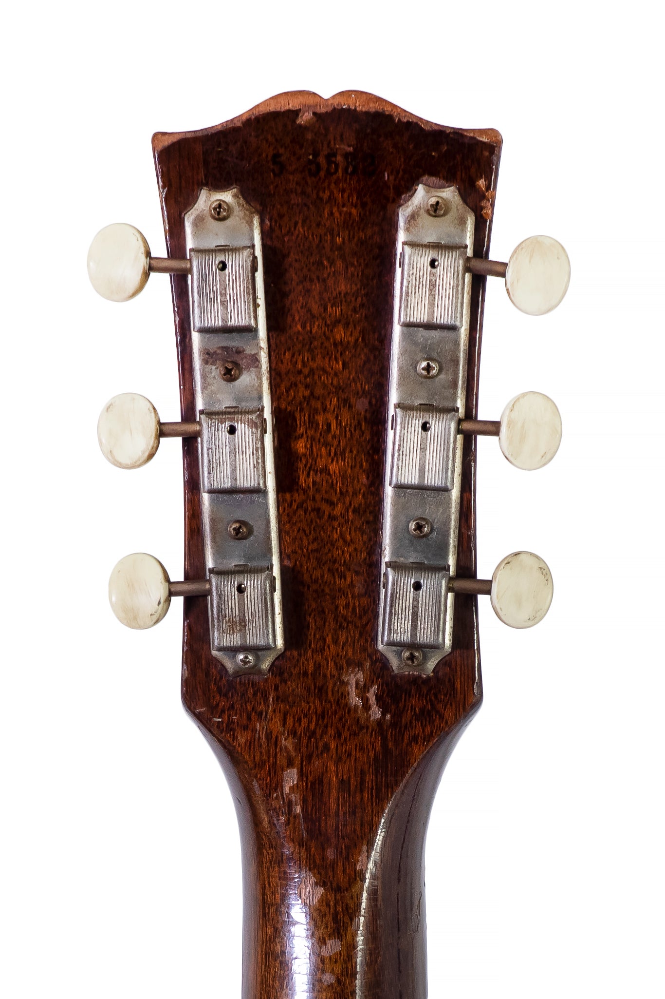 headstock and tuners from a vintage 1955 Gibson Les Paul Junior electric guitar