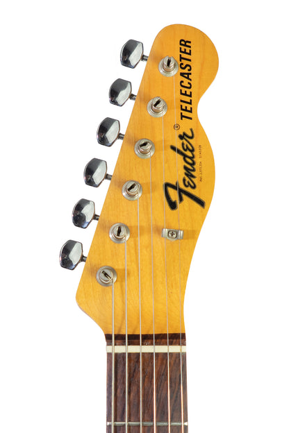 headstock from a Vintage 1968 Fender Telecaster electric guitar in white