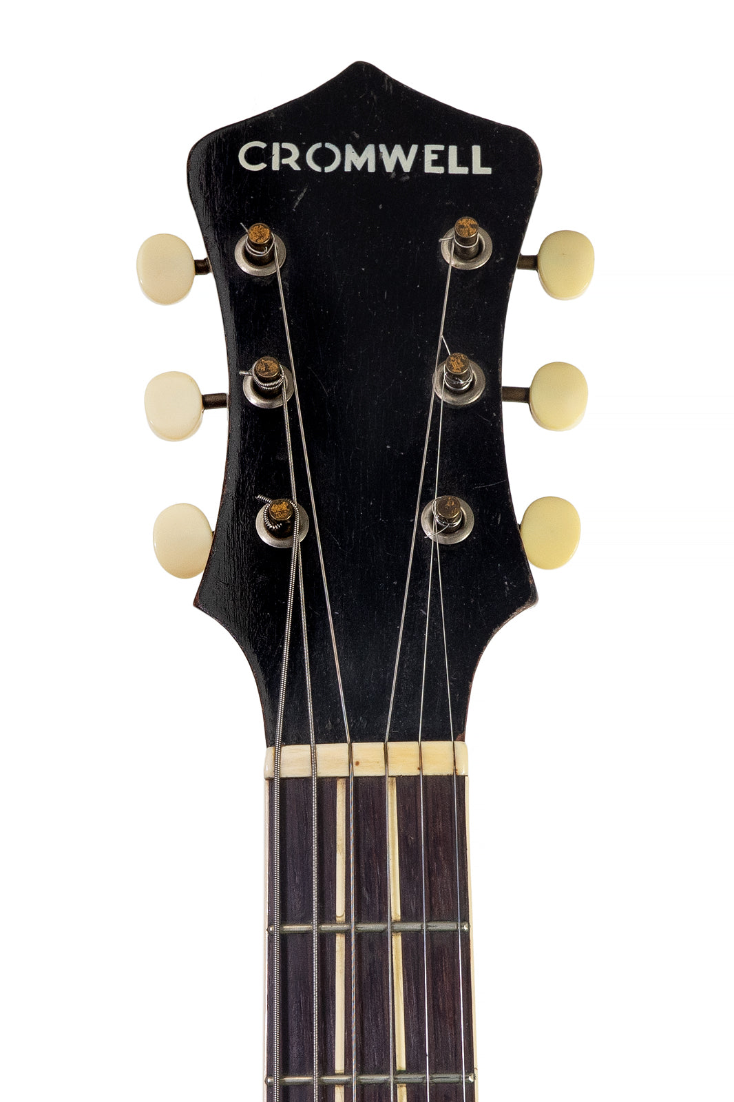 headstock from a vintage 1936 Cromwell G-4 archtop guitar